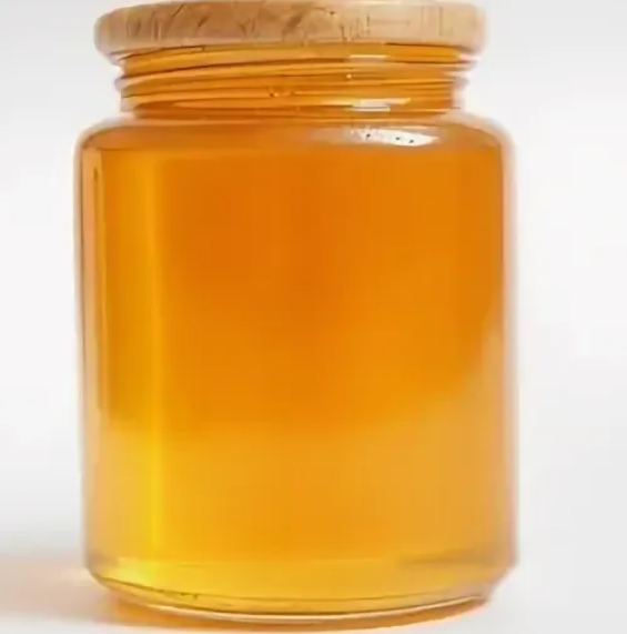 Assorted jars of honey on shelf